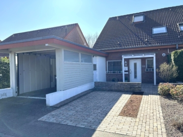 Eingangsansicht mit Carport - Topgepflegte Doppelhaushälfte in ruhiger Lage***4198 G in GT-Avenwedde